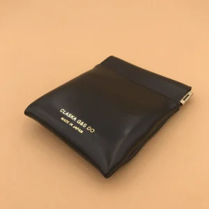 Mini pochette à ressort